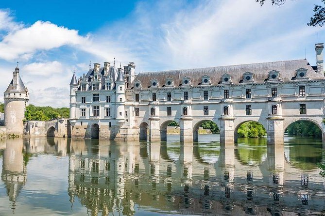 The Chateau de Chenonceau reaching across the river on its arches
